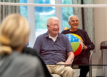 Immanuel residents playing chair volleyball